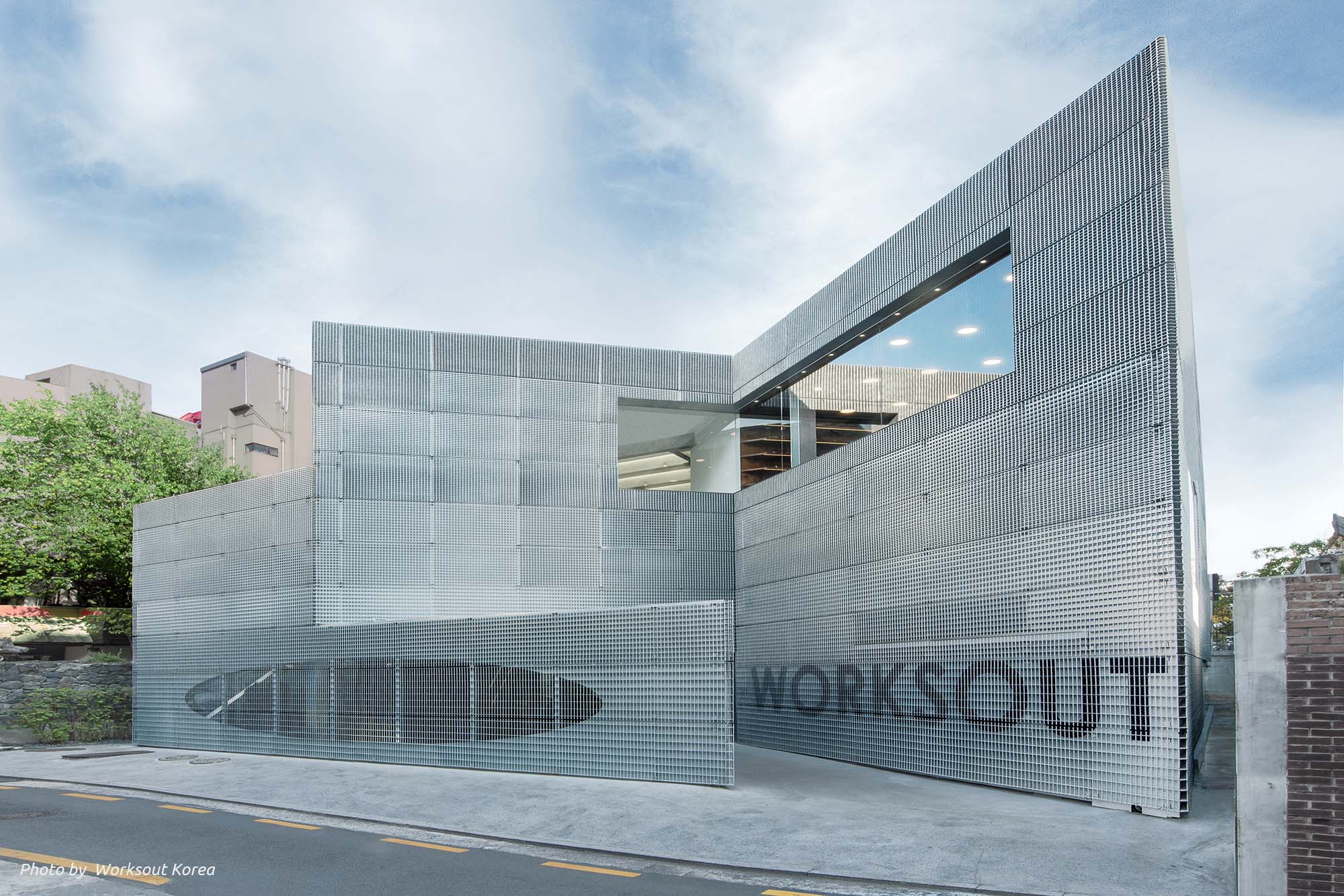 Futuristic exterior of three-storey conceptual store Worksout