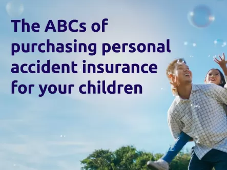 Asian family of 3 having fun with bubbles in the park